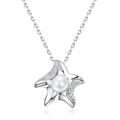 Description & Details Embrace the beauty of the sea with our meticulously crafted pieces that capture the essence of starfishes in stunning detail. From elegant starfish pendants to intricate starfish necklaces, our collection offers a range of styles to suit your unique taste. • Material: Solid 925 Sterling Silver ∙ Pearl ∙ Cubic Zirconia • Finish: Hypoallergenic ∙ Gold Plating•Dimensions: 40 - 45 cm chain , adjustable• All our work is custom made by hand with love Elegant Starfish Charm Jewelry For Gifts, Elegant Starfish Charm Jewelry As Gift, Elegant Starfish Charm Jewelry Gift, Silver Starfish Necklace For Gift, Ocean-inspired Star Necklaces For Gifts, Sterling Silver Starfish Charm Pendant Necklace, Sterling Silver Pendant Necklace With Starfish Charm, Elegant Sterling Silver Jewelry With Starfish Charm, Elegant Starfish Charm Pendant Jewelry