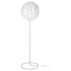 a white floor lamp with a round light fixture on it's end and a cord attached to the base