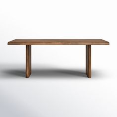 a wooden table on a white background with no one around it or the table is empty