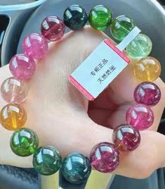 Material: tourmaline beads  size : 11mm quantity: one strands 6mm approx 29 pcs one strands 7mm approx25 pcs one strands 8mm approx 22 pcs one strands 9mm approx 21pcs one strands 10mm approx 19 pcs one strands 11mm approx 18pcs one strands 12mm approx 16 pcs one strands 13mm approx 16 pcs one strands 14mm approx 15 pcs one strands 15mm approx 14pcs one strands 16mm approx 14 pcs one strands 17mm approx 13pcs one strands 18mm approx 13pcs one strands 19mm approx 12pcs one strands 20mm approx 12p Rainbow Tourmaline, Tourmaline Beads, Gift For Woman, Nature Bracelets, Beads Bracelet, Bracelet Gift, Colour Tone, Natural Crystals, Tourmaline