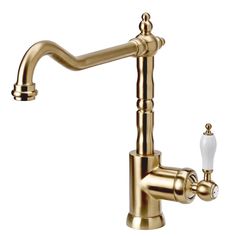 an antique brass faucet with two handles and white knobs on the side