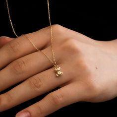 "14K Real Gold Bear Urn Pendant, Cremation Necklace For Ashes, Minimalist Bear Urn Necklace, Teddy Bear Urn Pendant, Sympathy Gift For Loss 🧸 D E T A I L S ------------------  ☆ Material: Solid Gold, real gold (not gold-filled or no gold-plated) ☆ Bear Height: 8 mm - 0.31 inches ☆ Bear Width : 11 mm - 0.25 inches ☆ Chain type: Cable (solid link) ☆ Chain width (mm): 0.72 mm, 0.84 mm ☆ Filling kit (funnel & pin) included There may be slight differences in measurements of the sizes due to handwork Bear Pendant Necklace, Cremation Necklaces For Ashes, Ash Necklace Cremation Jewelry, Teddy Bear Jewelry, Teddy Pendant, Urn Necklaces For Ashes, Teddy Bear Necklace, Diy Necklace Display, خواتم خطوبة