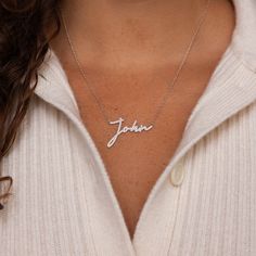 Let meaningful handwriting from a loved one become memorialized with our Pave Handwriting Necklace. This diamond necklace is not only sentimental but also a statement jewelry piece to show the importance of the handwriting being showcased. SKU: MM-NM77 Product Details Material: High Quality Solid 925 Sterling Silver Finish: Sterling Silver ∙ 18K Gold ∙ Rose Gold Size: The total necklace length includes the chain + charm (ex. chain + charm =18"). Necklace also comes with a 1" extension chain so y Signature Silver Jewelry With Names, Meaningful Nameplate Necklaces For Anniversary, Meaningful Name Necklaces For Anniversary, Meaningful Nameplate Necklace For Anniversary, Meaningful Anniversary Name Necklaces, Signature Necklaces For Anniversary And Mother's Day, Meaningful Silver Custom Name Necklace, Signature Sterling Silver Name Necklace For Anniversary, Meaningful Sterling Silver Name Necklace