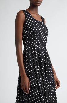 This polka-dot stretch-silk dress is part of D&G's Mambo collection inspired by styles of the '40s and '50s combined with the iconography of American pin-ups. Hidden back-zip closure Jewel neck Sleeveless Stretch-silk lining 91% silk, 9% spandex Dry clean Made in Italy Designer Clothing Fitted Polka Dot Dress For Daywear, Polka Dot Sleeveless A-line Dress, Polka Dot Fitted A-line Sleeveless Dress, Fitted Polka Dot Sleeveless A-line Dress, Fitted A-line Sleeveless Dress With Polka Dot Pattern, Fitted Polka Dot Sleeveless Dress For Spring, Fitted Polka Dot Midi Dress, Summer Polka Dot Dresses With Fitted Bodice, Chic Sleeveless Polka Dot Midi Dress