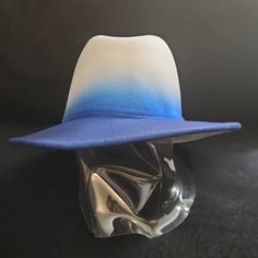 New Ombre Hat. Very Stylish. Never Worn. Blue Flat Brim Hat For Summer, Trendy Blue Wide Brim Hat, Trendy Blue Brimmed Fedora, White Fedora Felt Hat For The Beach, Blue Flat Brim Hat For Vacation, White Fedora Felt Hat For Beach, Casual White Felt Hat With Curved Brim, White Casual Felt Hat For Winter, Trendy Blue Hat For Vacation