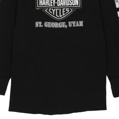 Description:Vintage St George Utah black Harley Davidson long sleeve t-shirt, fits xx-large.GENDER: womens CONDITION: very good.STYLE: long sleeve t-shirtERA: 1990sCOLOUR: blackFABRIC: cotton Black Long Sleeve Tops With Screen Print, Vintage Long Sleeve T-shirt For Winter, Vintage Black T-shirt For Fall, Vintage Black Winter Top, Vintage Black Tops For Winter, Vintage Black Top With Text Print, Grunge Long Sleeve T-shirt With Graphic Print, Black Long Sleeve Top With Logo, Vintage Long Sleeve T-shirt With Text Print