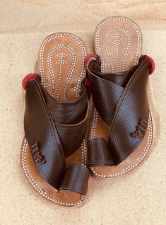 Use code COMBINEDSHIPPING and get $50 off your second pair. Check out all men's leather sandals: https://www.etsy.com/shop/sandcruisers/?section_id=25459641 You will love these traditional Arabian sandals. The straps and soles are made of leather. The leather lining will feel so soft and comfortable against your foot. They are designed to fit your foot loosely with lots of room in the toe-ring and straps. The leather sole will mold and shape to your foot over time, even creating an arch against Summer Leather Sandals, Mens Slide Sandals, Sandals For Men, Leather Sandals Handmade, Mens Leather Sandals, Brown Leather Sandals, Toe Ring, Palm Beach Sandals, Toe Rings