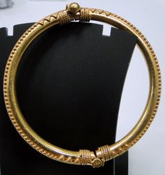 "22K Solid Gold Hallmarked bangle bracelet From Rajasthan Northern India. Classic design with secure pin closing. (free size) ,very well made, Inner diameter-5.5 cm(2.16\"), Inner circumference-17.27 cm(6.79\"), outer diameter-7 cm. width-0.5 cm,weight-34 grams." Antique Gold Bangle With Jubilee Bracelet, Ceremonial Temple Jewelry Gold Bracelet, 22k Gold Openable Bangle Bracelet, Gold Openable Round Bangle, Gold Temple Jewelry Bracelets, Yellow Gold Openable Bangle, Openable Yellow Gold Bracelet, Traditional Yellow Gold Brass Bangle, Antique Gold Round Bangle