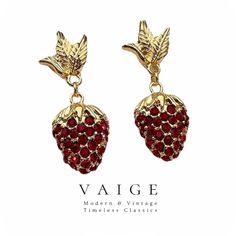 VAIGE Red Strawberry Zirconia Gold Plant Earrings Indulge in the exquisite charm of our Red Strawberry Zirconia Gold Plant Earrings, where elegance meets artistry. Meticulously crafted with high-quality 925 Silver, these earrings showcase a stunning design that effortlessly enhances your style. Features of these remarkable earrings include: Radiant Zirconia Stones: Adorned with vibrant red zirconia that captures light beautifully, adding an eye-catching sparkle. Elegant Drop Design: The graceful Plant Earrings, Drop Design, Red Strawberry, Drops Design, Classic Collection, Star Earrings, Vibrant Red, Timeless Classic, Accessories Bracelets