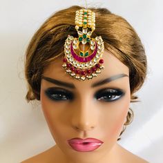 a mannequin headpiece with jewels and pearls