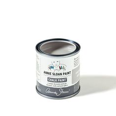 an open can of chalk paint on a white background