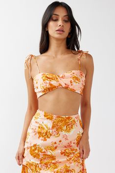 Gabbi Tied Shoulder Crop Top Floral Orange by Selfie Leslie Summer Floral Print Crop Top For Party, Spring Floral Print Cropped Crop Top, Floral Print Crop Top For Brunch, Chic Floral Print Crop Top For Brunch, Chic Floral Print Crop Top For Day Out, Feminine Summer Beach Crop Top, Chic Sleeveless Floral Print Crop Top, Chic Bandeau Crop Top For Brunch, Summer Floral Print Crop Top For Beach