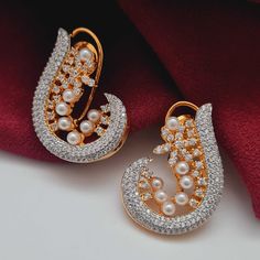 Experience the perfect combination of timeless elegance and modern sophistication with our Veda AD Earrings from the Royal Heritage Collection. Meticulously crafted in the USA and intricately detailed in India, this piece embodies opulence and grace, making it a must-have in our luxurious collection. Its lightweight and versatile design adds a touch of regal allure to any ensemble, elevating your style and completing the regal line. Handcrafted Metal: Metal Alloy, Gold Plated Stone: American Dia Ad Earrings, Hand Harness, Bangle Ring, Kundan Earrings, Foot Jewelry, Heritage Collection, Bangle Set, 50th Gifts, Gift Card Shop