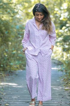 There is a lot to love about these chequered pyjama set,if you are fan of Japanese design then these pjs will not disappoint you! Made with the softest organic cotton. The arm and leg length is shorter than more conventional pjs but they look fabulous and quirky. The top has a boxy body with 3/4 wider sleeves and trousers are cropped slightly above the ankle length. Organic cotton is so soft and is known for its breathable and lightweight quality keeps you cool in summer and toasty in winter Features  - Pure soft cotton  - Vegan product  - Lightweight and breathable  - Elastic waist with drawstring  - Button closure  - Straight full length trousers  - Gorgeous print available in two colours  - Generously sized for comfort  - Washes and dries quickly  - Ethically made in India - Machine was Comfortable Relaxed Fit Pajama Party Sets, Cotton Sleep Sets With Long Pants, Cotton Sleepwear For Summer, Cotton Sleepwear Long Pants For Spring, Comfortable Matching Sleepwear Set For Spring, Comfortable Matching Set Sleepwear For Spring, Summer Cotton Sets With Long Pants, Spring Matching Set Sleepwear For Sleepover, Pink Cotton Relaxed Fit Sets