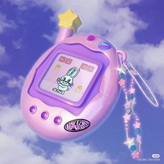 an electronic toy flying in the air with a star on it's back end