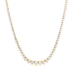 A stunning 6.0 carat tennis necklace with a major upgrade - an adjustable bolo tie closure. Wear this necklace as long as 24" or as short as choker length.  Available in Yellow Gold or White Gold 6.0 total carat weight Adjustable solid gold chain that delicately hangs down the back 14K Gold Benefits of Solid 14k Gold J Luxury White Gold Tennis Necklace Gift, Luxury Yellow Gold Tennis Necklace, Luxury Gold Tennis Necklace With Prong Setting, Classic Round Tennis Necklace With Adjustable Chain, Classic Single Strand Cubic Zirconia Tennis Necklace, Classic Diamond Tennis Necklace With Adjustable Chain, Classic Single Strand Lariat Necklace, Classic White Gold Lariat Necklace, Diamond Tennis Necklace With Adjustable Chain For Formal Occasions