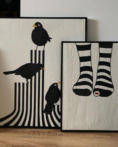 three black and white paintings with birds on them