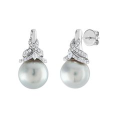 Stunning Drop Earrings The earrings are 18K White Gold There are 0.52 Carats in Diamonds G/H VS/SI South Sea Pearls 12.25MM The pearls are Bluish Pink in Color The pearls changes color depending on the light. The earrings measure almost 1.00" Length The earrings weigh 12.3 grams Luxury Pear-shaped Earrings With Diamond Accents, Luxury Platinum Pearl Earrings For Formal Occasions, Formal White Gold Pear Shaped Earrings, Formal White Gold Pear Earrings, Luxury Platinum Pearl Earrings, Luxury Pear-shaped Brilliant Cut Earrings, Luxury Pear-shaped Earrings For Evening, High Luster Diamond Earrings For Formal Occasions, Luxury High Luster Earrings For Formal Occasions