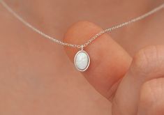 "Handmade Necklace 14k Solid Gold Opal Necklace, White Gold Opal Necklace, Oval Opal Necklace, 14k Gold White Opal Necklace, Gift for Mom, Mothers Day Gift * Material: 14k solid gold * Finished Color: white gold, rose gold, yellow gold H O W ∙ T O ∙ O R D E R - Select options from the drop-down menu - Add to cart and proceed to checkout GEMSTONE DETAILS Stone: White Opal Size:9x6 mm Shape: Oval Carnelian is the best-known and generally least expensive variety of chalcedony. *Carnelian is an exce Opal Silver Jewelry, Opal Necklace Aesthetic, White Opal Necklace, White Opal Jewelry, White Oval Necklace For Anniversary, White Oval Necklaces For Anniversary, White Oval Pendant Necklace With Birthstone, Dainty Oval Necklace Ideal For Gifts, Dainty Oval Necklace For Gift