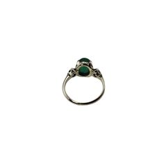 Vintage 14 Karat White Gold Emerald and Diamond Ring Size 4.5   This elegant ring features on oval cabochon emerald (8.8 mm x 7.2 mm) and two round brilliant cut diamonds set in classic 14K white gold.  Shank: 1.4 mm.  Emerald weight: 1.71 ct.  Total diamond weight: .12 ct.  Diamond clarity: VS1-VS2  Diamond color: G-H  Ring Size: 4.5  Stamped: 14K  Weight: 2.2 gr./ 1.4 dwt.  JAGi Certificate included.  Very good condition, professionally polished.  Will come packaged in a gift box or pouch (when possible) and will be shipped U.S. Priority Mail Insured. Classic Green Signet Ring With Center Stone, Classic Oval Bezel Set Opal Ring, Luxury White Gold Oval Cabochon Emerald Ring, Classic Oval Opal Ring With Bezel Setting, Timeless Oval Emerald Ring With Bezel Setting, Formal Opal Ring With Bezel Setting, Elegant Green Emerald Ring With Round Stone, Formal Polished May Birthstone Signet Ring, Formal May Birthstone Signet Ring With Polished Finish