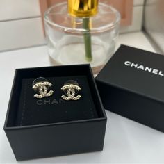 Great Preowned Condition. Approximately The Size Of A Dime. The Pearls Make This Classic And Sophisticated. Perfect Size And Goes With Everything. Gold In Color. Comes With Chanel Box Only. I Loved These, But Bought As A Birthday Gift For My Mom And She Picked A Different Chanel Pair! Reposhing This Item I Purchased From @Mleeluxe And Therefore, They Are Already Authenticated And In The Same Box. Selling Them For The Same Price I Paid For Them. Questions? Leave A Comment Below! Channel Earrings, Chanel Stud Earrings, Chanel Pouch, Lirika Matoshi, Chanel Jewelry Earrings, Chanel Brooch, Jewelry Chanel, Chanel Box, Plastic Earrings