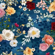 a blue background with many different colored flowers