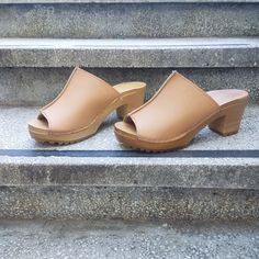 MADE FROM VEGAN LEATHER AND ALDER WOOD Clogs for Women Toren HIGH heals ergonomic wooden sole and Vegan leather. made to order. Available in sizes 36-41. For other sizes please contact me EUR 35 l UK 2.5 l AUS 4.5 l USA 5 l up to 22.3cm l 8.78 inches  EUR 36 l UK 3.5 l AUS 5.5 l USA 6 l up to 23cm l 9.02 inches EUR 37 l UK 4 l AUS 6 l USA 6.5 l up to 23.7cm l 9.33 inches  EUR 38 l UK 5 l AUS 7 l USA 7.5 l up to 24.5cm l 9.65 inches EUR 39 l UK 6 l AUS 8 l USA 8.5 l up to 25.3cm l 9.96 inches EUR Wooden Heel Slip-on Clogs For Spring, Vegan Clogs, Brown Synthetic Slip-on Clogs, Wooden Slip-on Clogs With Wooden Heel, Brown Leather Clogs With 4-inch Heel, Leather Clogs With Branded Insole, Medium Width, Swedish Clogs, Clogs And Mules, Womens Clogs