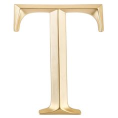 the letter t is made out of gold metal and has a rounded base with an irregular shape