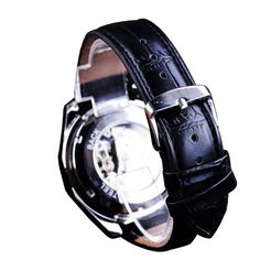 This steampunk watch is made of a stainless steel case with a leather band that is secured by the buckle clasp. Incorporating a military design into your elegant look, this ultimate watch is beautified with silver and black. The transparent, skeleton dial of this exclusive watch is truly unique, as is its automatic, self-wind movement. Wear this attractive watch to any event and get noticed in seconds. Steampunk Men, Steampunk Watch, Military Design, Skeleton Watches, Military Inspired, Stainless Steel Band, Sport Watches, Mechanical Watch, Automatic Watch