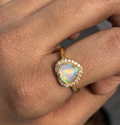 Product Details : ✦ Stone Name: Ethiopian Opal ✦ Metal : Gold plating on Genuine 925 Solid Sterling Silver This is a beautiful heart shape jewelry set which consist of Earrings, pedant and ring. It is made with lots of love and warmth! For more pieces like these visit https://www.etsy.com/in-en/shop/kanchanglobal?ref=seller-platform-mcnav&section_id=27149585 Your satisfaction is our priority ! ---------------------------- A great gift idea for: Birthdays Valentines Day Gift Anniversary Gift Gold Ethiopian Opal Ring For Anniversary, Fine Jewelry Opal Birthstone, Opal Birthstone Fine Jewelry, Gold Opal Jewelry With Prong Setting, Gold Ethiopian Opal Birthstone Ring, Fine Jewelry Multi-stone Opal Jewelry, Gold Opal Multi-stone Jewelry, Opal Jewelry With Halo Setting For Gift, Multi-stone Opal Fine Jewelry