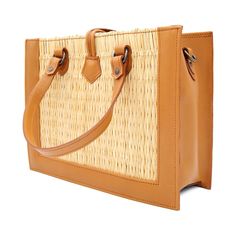 Product Description Classic but bold, this straw handbag is crafted with organic reed allied with vegetable tanning leather details, making it a timeless bag. Handmade using traditional Portuguese woven methods, by a family of master artisans, this is a masterpiece that unites old-world weaving techniques with a modern look. Designed so that you can make the most of your day-to-day life. Take it to the office or on a date and be assured that your outfit will pop from the others. Its removable sh Luxury Straw Shoulder Bag In Rectangular Shape, Luxury Rectangular Straw Shoulder Bag, Elegant Natural Fiber Shoulder Bag In Natural Color, Rectangular Rattan Straw Bag With Braided Handles, Woven Leather Straw Bag With Top Handle, Top Handle Straw Bag With Woven Leather, Beige Rectangular Shoulder Bag With Bamboo Handle, Luxury Rectangular Straw Bags, Handwoven Straw Shoulder Bag With Top Handle