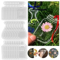 clear glass bottle with flower inside and ribbon around the bottom, set of 10 pieces