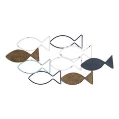 three metal fish hanging from the side of a white wall with blue and brown accents