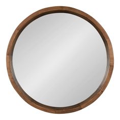 a round wooden mirror on a white background