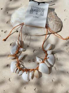 Shop Boho Seashell Choker Necklace | Beach Seashell Necklace | Ocean Treasure | COCO DE CHOM Starfish Charm Necklace For Beach, Starfish Charm Strand Jewelry For Vacation, Starfish Charm Jewelry For Vacation, Strand Jewelry With Starfish Charm For Vacation, Vacation Jewelry With Starfish Charm On Strand, Vacation Jewelry With Starfish Charm, Summer Ocean-inspired Necklace With Starfish Charm, Ocean-inspired Strand Necklace With Starfish Charm, Adjustable Beachy Shell Jewelry