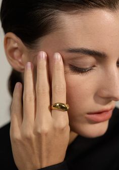 The Mckayla Ring is a sleek and stylish addition to any outfit. Made of smooth stainless steel with an 18K PVD plating, this minimalist geometric finger ring is not only waterproof but also distinctive and eye-catching. Elevate your jewelry collection with this unique and versatile Bijoux piece. Modern Adjustable Dome Ring For Everyday, Modern Everyday Dome Ring, Minimalist Adjustable Wide Band Ring, Tarnish Resistant, Minimalist Gold Plated Signet Ring With Polished Finish, Minimalist Polished Gold Plated Signet Ring, Modern Open Dome Ring For Everyday, Minimalist Wide Band Open Ring, Tarnish Resistant, Minimalist Wide Band Ring Tarnish Resistant, Minimalist Wide Band Open Ring Tarnish Resistant