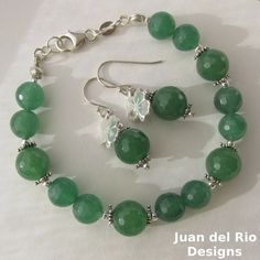 Lucky jade, lucky clover, lucky stars ... This is a one of a kind set of bracelet and dangling earrings with emerald green faceted Jade.  The beads of the bracelet measure 8 mm and 10 mm in diameter, the jade of the earrings is 10 mm in size. With 2 mm silver round beads and 5 mm solid silver decorative beads, that have the form of little stars and are partly oxidized.  And there are two lucky clover charms of 10 mm in size, these have a silky matte surface in the front and on the back they are somewhat corrugated. The total length of the bracelet is approx. 19 cm - 7 1/2 inch, therefore suitable for a small or medium wrist. Strung on supple nylon-coated stainless steel beading wire, the bracelet drapes gently around the wrist. The earrings are 3.3 cm long - 1 1/4 inch, including the ear h Good Luck Charms, Decorative Beads, Clover Charm, Pretty Pendant, Clover Earrings, Lucky Clover, Lucky Star, Luck Charms, Jade Jewelry