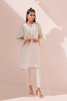 SKU: 3005 Price for Shirt & Trouser 2pc Dreamy and elegant, this masterpiece is made up using soft crepe sikh fabric decorated with cutwork details paired with a classic embroderied pants with sequins finishing adds a hint of elegance to the overall look of this ensemble. Elegant Straight Kurta Kaftan For Summer, Eid Unstitched Georgette Kaftan, Eid Georgette Unstitched Kaftan, Embroidered Georgette Pant Set, Designer Long Sleeve Pant Set For Spring, Designer Palazzo Set With Tunic For Eid, Elegant Festive Palazzo Set With Tunic, Spring Tunic Sets With Resham Embroidery, Spring Sets With Resham Embroidery Tunic