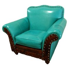 a blue leather chair with studded trimmings