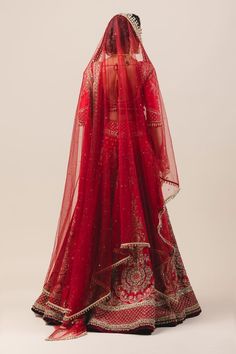 Red 14-panelled raw silk lehenga with zardozi embroidery. Comes with blouse, net dupatta and embellished veil.
Component: 4
Embroidered
Neckline: V Neck
Sleeve Length: Long
Fabric: Lehenga and blouse: Raw Silk; Dupatta: Soft net; Veil: Tulle
Color: Red
Plunging neck
Bead tassels
Cutout back - Aza Fashions Red Anarkali Set With Intricate Embroidery, Red Anarkali Set With Dupatta For Reception, Red Organza Floor-length Saree, Floor-length Red Organza Saree, Red Anarkali Set For Reception With Traditional Drape, Red Traditional Wear With Cutdana For Reception, Red Saree With Sheer Dupatta For Reception, Red Cutdana Traditional Wear For Reception, Red Organza Gown With Resham Embroidery