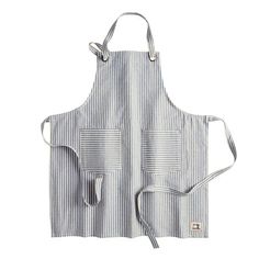 a striped apron with two pockets on the front, and one pocket in the back