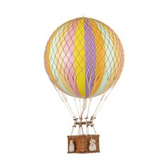 a multicolored hot air balloon flying in the sky