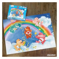 two children's jigsaw puzzles with bears and rainbow in the background