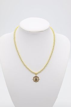 This elegant Gold Beaded Necklace features a stunning Star Pendant (4mm) as its centerpiece. Crafted with exquisite attention to detail, this necklace adds a touch of sophistication to any outfit. The 4mm beaded design provides a delicate yet eye-catching appeal. Perfect for special occasions or everyday wear. Length: 16” Closure: Lobster Claw Pendant: 0.60” (Length) 0.60” (Width) Material: Brass with 18K Gold Plating with Rhodium Coating Lead Free and Hypoallergenic Gold Beaded Pendant Necklaces, Gold Pendant Necklace With Gold Beads, Star Charm Necklaces With Round Beads For Jewelry Making, Gold Beaded Pendant Necklace With Tiny Beads, Gold Beaded Necklaces For Jewelry Making (8mm Beads), Gold Charm Necklaces With Round Beads, Gold Necklaces With Star Charm And Round Beads, Gold Pendant Necklace With Tiny Beads, Gold Necklace With Star Charm And Round Beads