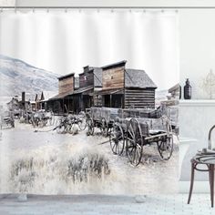 an old western town shower curtain in a bathroom