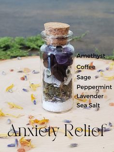 Anxiety relief spell jar photo with labels of what is inside- amethyst, coffee, sage, peppermint, Lavender, sea salt Clear Quartz Spell Jar, Emotional Protection Spell Jar, Basic Spell Jars, Wich Craft Spells Jar, Fake Witch Spells, Herbs For Spell Jars, Herbs In A Jar, Spell Jar For Beauty, Spell Jar Wax Color Meaning