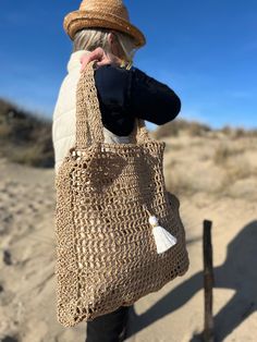 Handmade natural fiber tote bag ideal for the beach Eco-friendly Natural Fiber Beach Bag For Everyday Use, Eco-friendly Woven Beach Bag, Eco-friendly Natural Fiber Beach Shoulder Bag, Eco-friendly Natural Fiber Beach Basket Bag, Eco-friendly Natural Fiber Beach Bag With Open Weave, Feb 13, Natural Fibers, Handmade Natural, The Beach