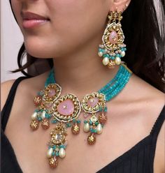 Adorn yourself in timeless elegance with this exquisite pink blue   Kundan choker necklace set, perfect for weddings and special occasions. Crafted with meticulous attention to detail, the set features delicate pink and blue hues reminiscent of Pakistani and Punjabi traditions, with a touch of Bollywood glamour. Complete with matching earrings and a stunning maangtika, this Indian Kundan ensemble effortlessly captures the essence of sophistication and grace. Measurements:  Weight- 110gms  Neckla Blue Bollywood Kundan Jewelry Sets, Traditional Pink Kundan Choker Necklace, Blue Kundan Bollywood Necklace, Choker Necklace Set Kundan Pink Heavy, Pink Bollywood Kundan Necklace, Bollywood Glamour, Maang Tika, Kundan Choker Set, Kundan Choker