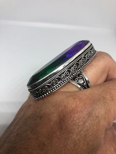 Large brilliant antique glass Ornate German Silver Vintage ring, does not tarnish Size 9 can be re sized All rings are shipped in a nice gift box. Check out our over a THOUSAND great reviews Engraving is $4 per letter and is not always perfect depending on the piece. It can take a few days if the jeweler is busy. This is payable to Paypal Judithsltd@gmail.com Vintage Crystal Ring With Stone Setting As Gift, Iridescent Spiritual Rings As Gifts, Handmade Vintage Crystal Ring Gift, Handmade Vintage Crystal Ring For Gift, Iridescent Oval Crystal Ring As Gift, Iridescent Oval Crystal Ring Gift, Iridescent Oval Crystal Ring For Gift, Antique Crystal Ring As Gift, Unique Crystal Ring With Large Stone As Gift