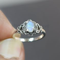 "Moonstone Boho Ring - Rainbow Moonstone Sterling Silver Ring - Oxidized Ring - Statement Ring - Moon Stone Ring - Rainbow Moonstone Ring SHOP LINK:- https://www.etsy.com/shop/MaaShabashibaJewell?ref=seller-platform-mcnav 》D E T A I L S《 Gemstone: Natural Rainbow Moonstone Gem Color: White Stone Shape: Oval Metal: 925 Sterling Silver Purity: 925 Parts Per 1000 Setting Type: Prong Set Silver Polish: High Ring Size: All Size Available Please note that there Can be slight variations in stone textur Adjustable Moon Shaped Gemstone Jewelry, Vintage Moonstone Ring Jewelry, Adjustable Moon-shaped Gemstone Jewelry, Moonstone Promise Ring With Moon Phase Detail, White Moon Shaped Ring With Birthstone, White Birthstone Ring In Moon Shape, White Moon-shaped Birthstone Rings, Round Moonstone Jewelry With Stone Setting, Sterling Silver Oval Rings With Moon Phase